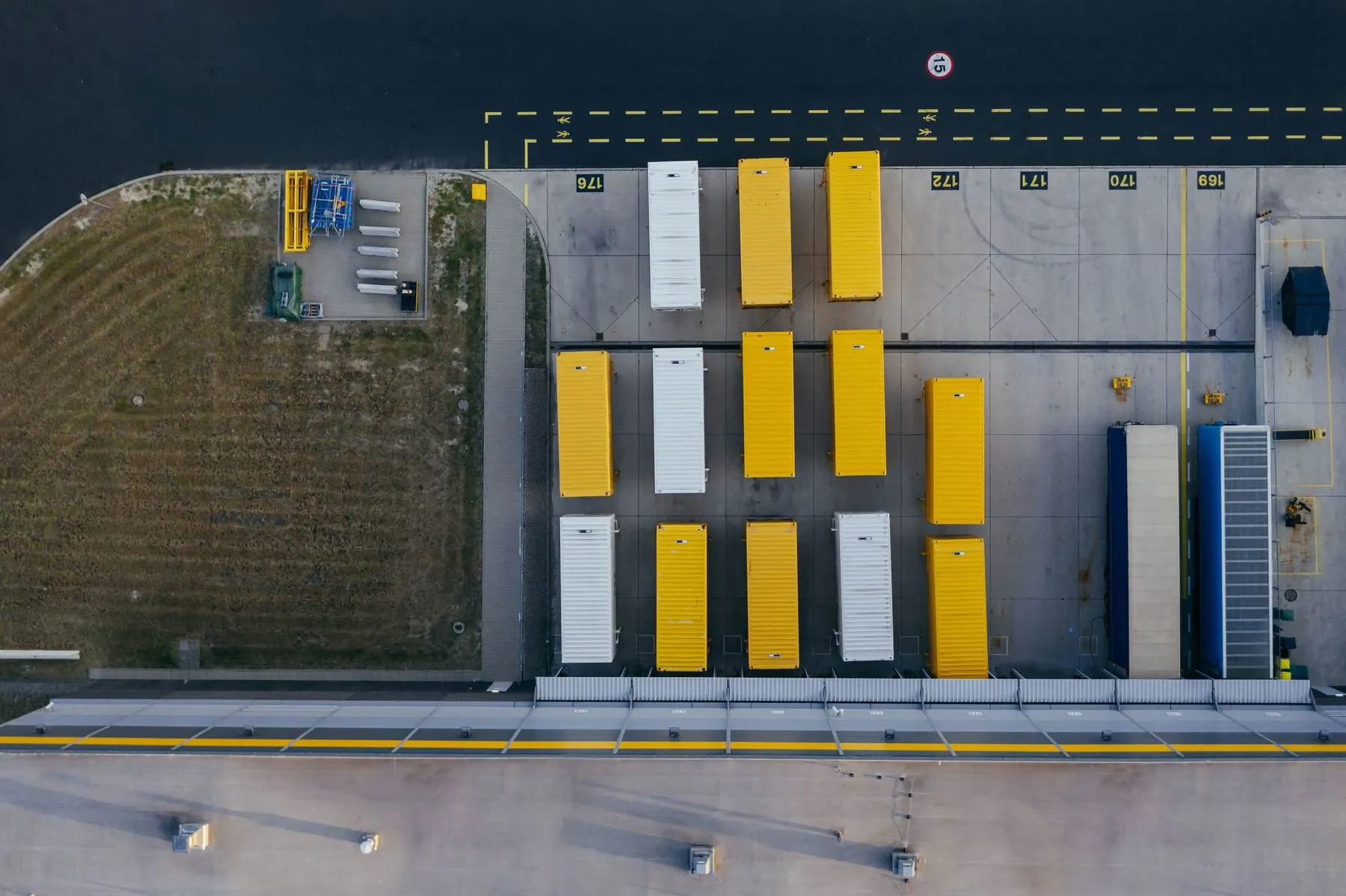 Aerial view of trailers at warehouse loading docks